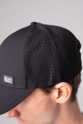 Alyth Active Alyth Waterproof Hat in Black - Women's Workout Clothing Front View
