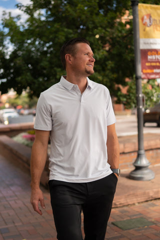 Alyth Active Momentum Polo in Black - Women's Workout Clothing Front View