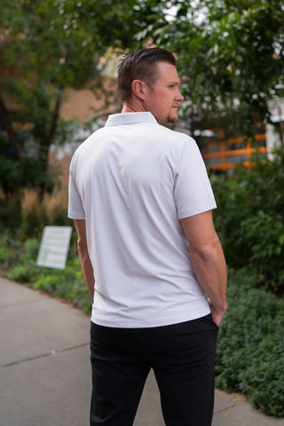 Alyth Active Momentum Polo in Black - Women's Workout Clothing Side View