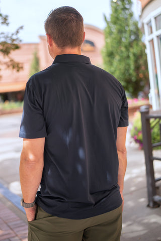 Alyth Active Momentum Polo in Navy - Women's Workout Clothing Back View