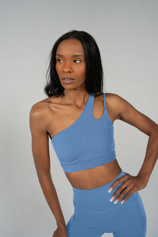 Alyth Active Serene Transform Asymmetical Sports Bra in Aero Blue - Women's Athletic Sports Bra Front View